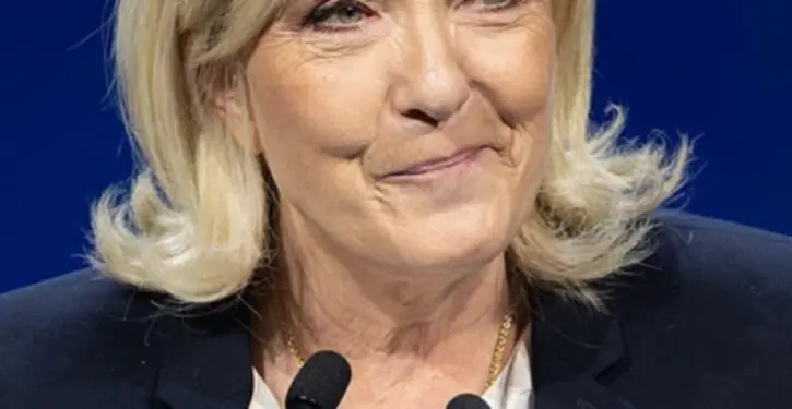 French court clears way for Nationalist Le Pen to run for president but orders her to wear electronic tag