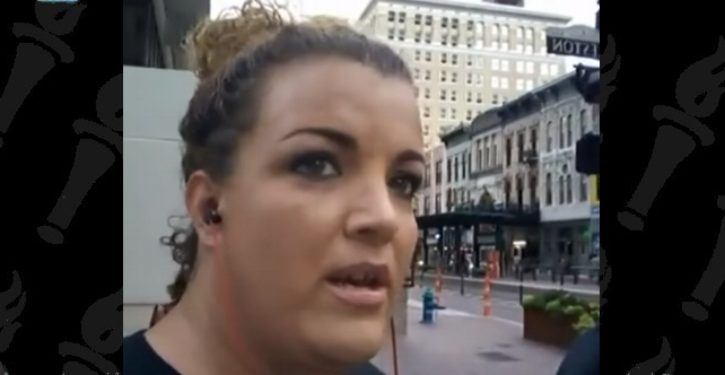Black Lives Matter activist accused of punching horse arrested for outstanding warrants on way to court