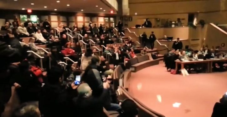 Angry Canadians shout down school board meeting, shred Quran over Muslim ‘accommodations’