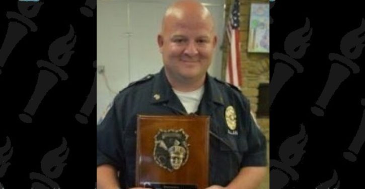 Indiana police officer shot and killed while coming to the aid of car crash victims