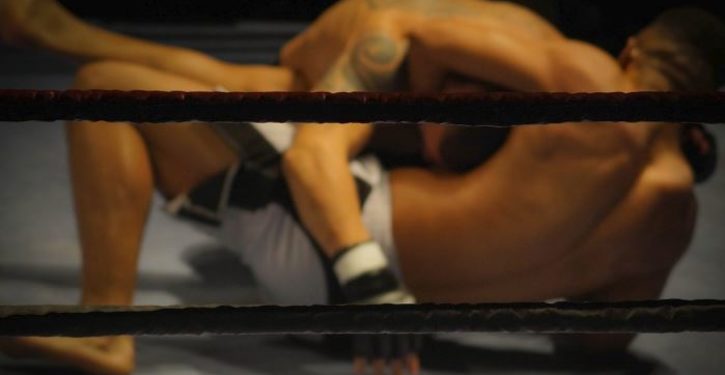 Iranian wrestler throws match to avoid having to touch an Israeli in next match