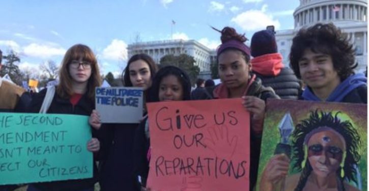 Student with sign reading ‘Guns don’t kill people, people kill people’ removed by principal