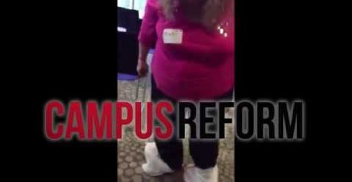 Feminist activist wears plastic bags on shoes to mock Joni Ernst — and fails bigtime (Video)