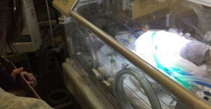 Heart-wrenching story of father singing to dying newborn son after wife dies in childbirth (Video)