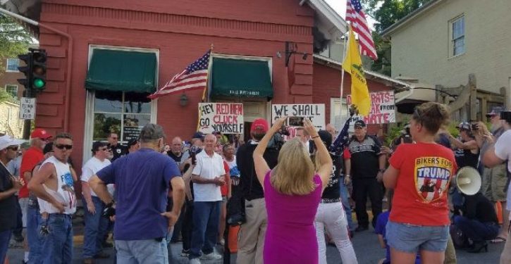 Reopening of Red Hen restaurant greeted by ‘Cluck you!’ protest