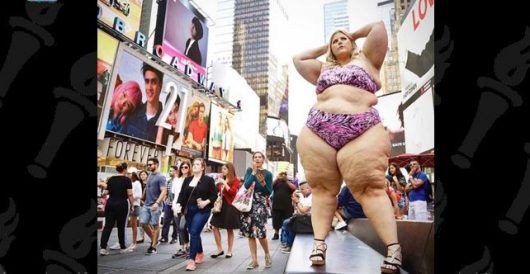 What happens when a fat (er, big boned) women poses in a teeny-weeny bikini in Times Square? by LU Staff