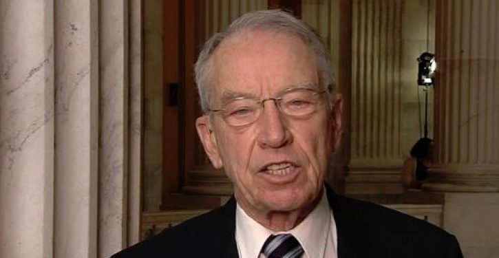 Grassley calls vote, Kavanaugh advances on party lines in committee