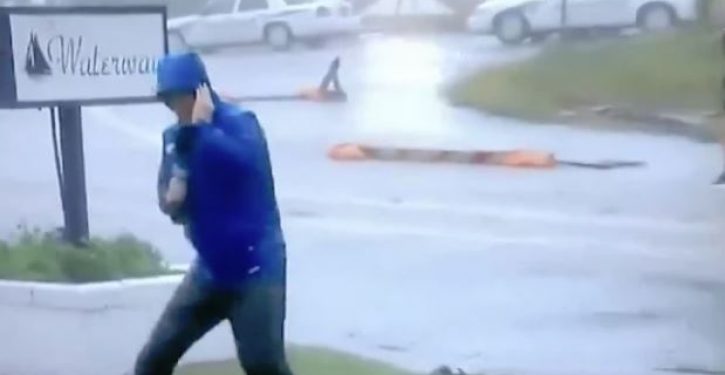 And the Oscar goes to … Weather Channel guy hamming it up to show how fierce winds are