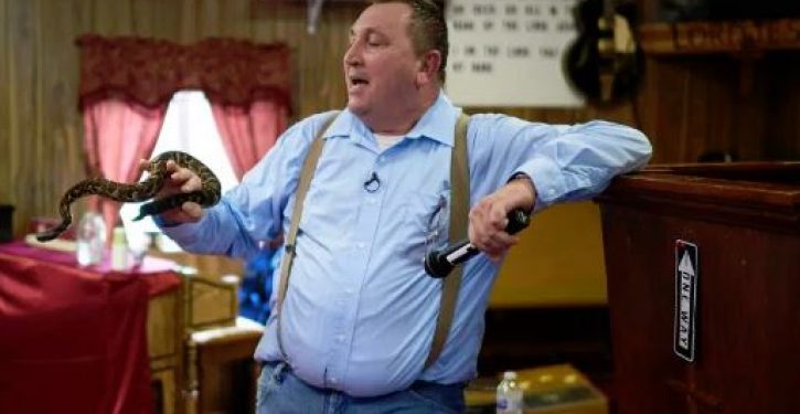 In this church, worshipers grab rattlesnakes, drink poison — sometimes fatally — to prove their faith