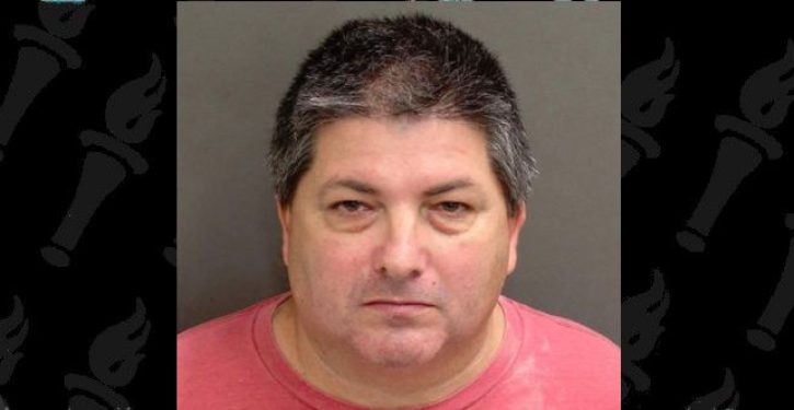 Santa Claus led away in handcuffs because he didn’t report his job as a pro Santa