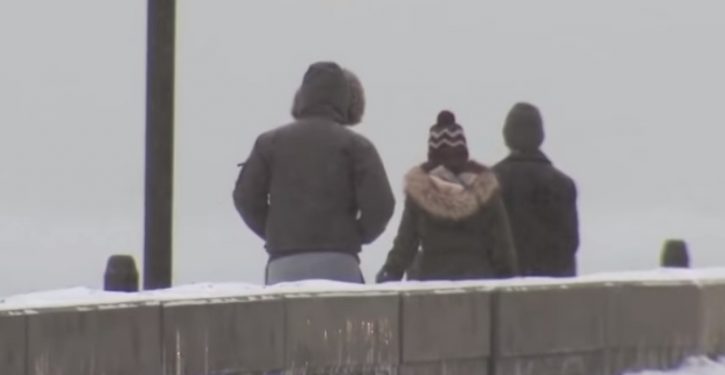In frigid Chicago, people are being robbed of their coats at gunpoint