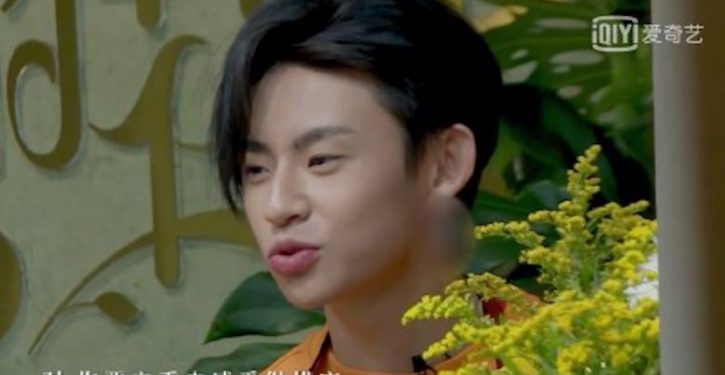 Why is China blurring men’s earlobes in photos?