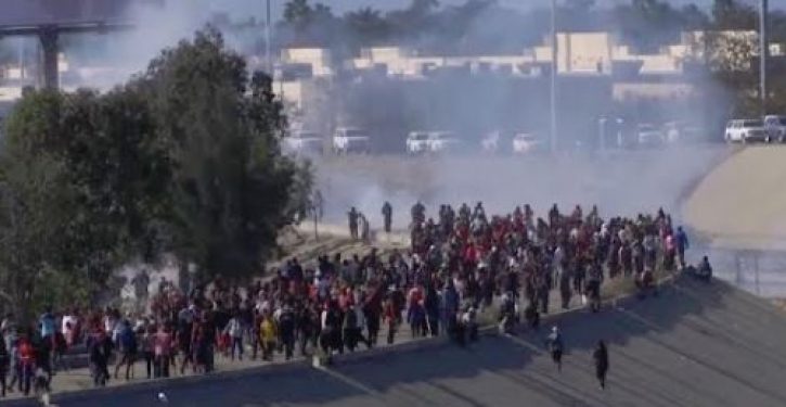 Border Patrol fires tear gas after caravan migrants rush U.S. border, throw rocks, on New Year’s Eve