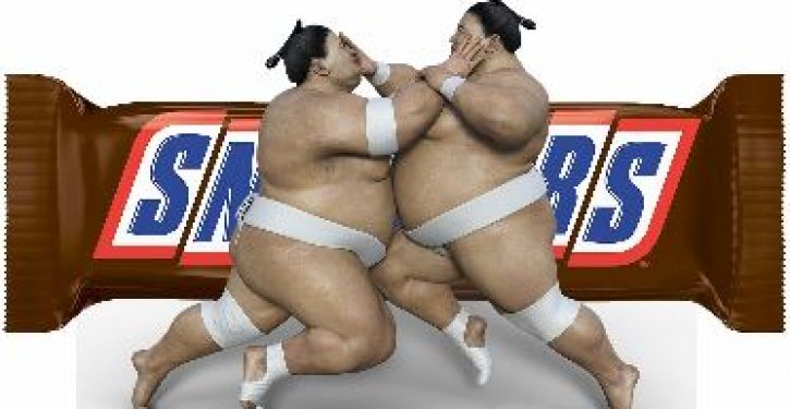 Woman in sumo wrestler suit assaults ex-girlfriend who waved at man dressed as Snickers bar