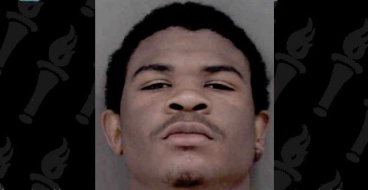 16-year-old charged with murder after two people found shot in car