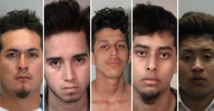 Teen stabbed about 100 times and set on fire in MS-13 murder, police say