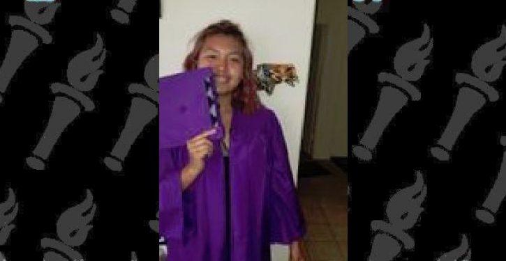 American Indian student protests after she is barred from wearing tribal cap to graduation