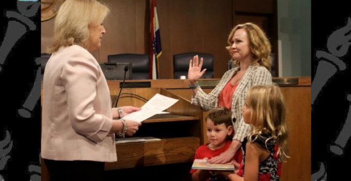 Atheist Dem sworn into office using a book by Dr. Seuss