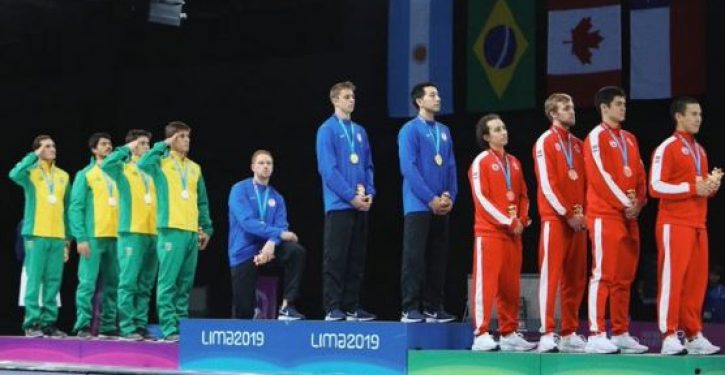 U.S. fencing medalist kneels during national anthem at Pan Am Games