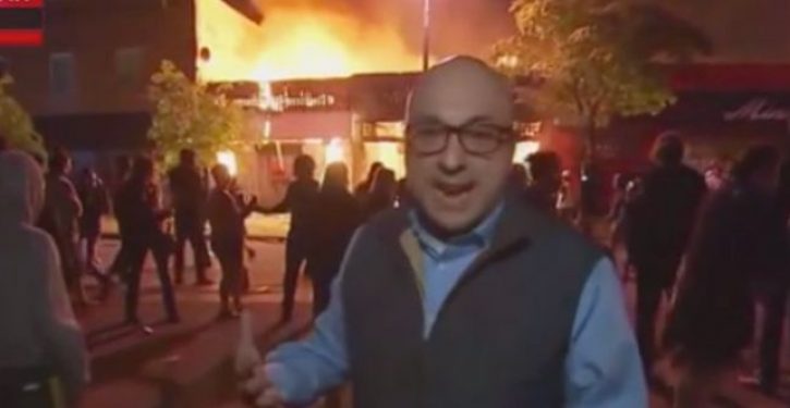 MSNBC reporter assures viewers protests mostly peaceful while standing in front of burning buildings