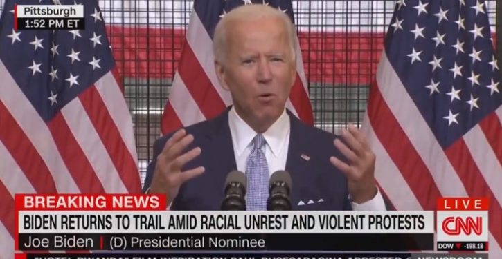 Is Joe Biden reading scripted answers to questions from the media at news conferences?