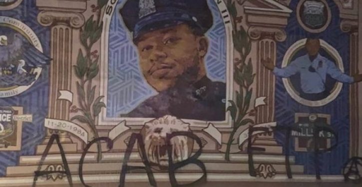 Anti-police graffiti spray-painted on mural of slain Philadelphia police officer