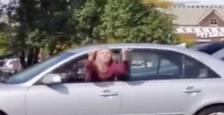 Woman behind wheel flips bird at Trump rally, rear-ends car in front of her, gets ticket