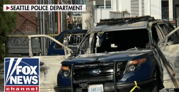 Man arrested in Seattle for torching police car … with officer still inside!