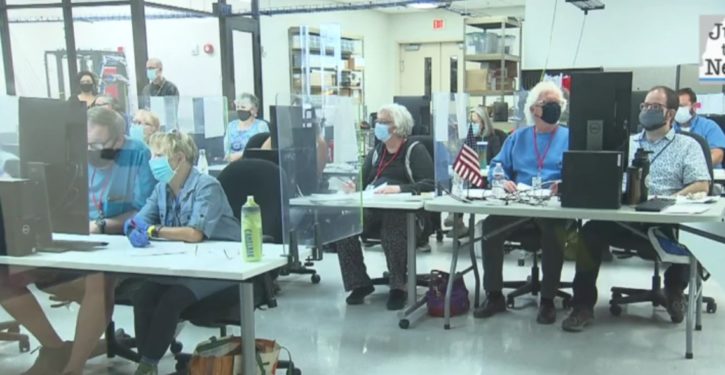 Poll workers told to leave, then suitcases full of ballots pulled out