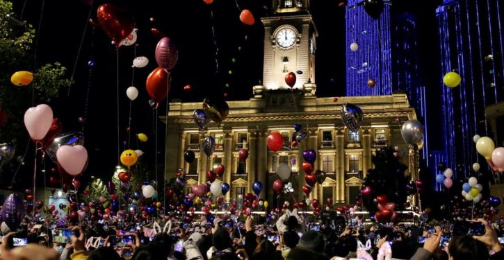 Crowds thronged Wuhan, where pandemic began, to celebrate New Year