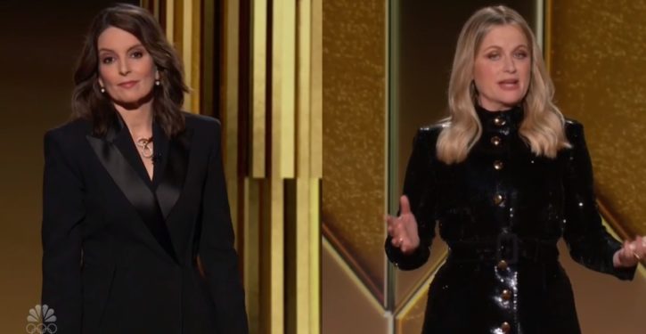 Tina Fey breaks promise of politics-free Golden Globes in first few minutes of broadcast