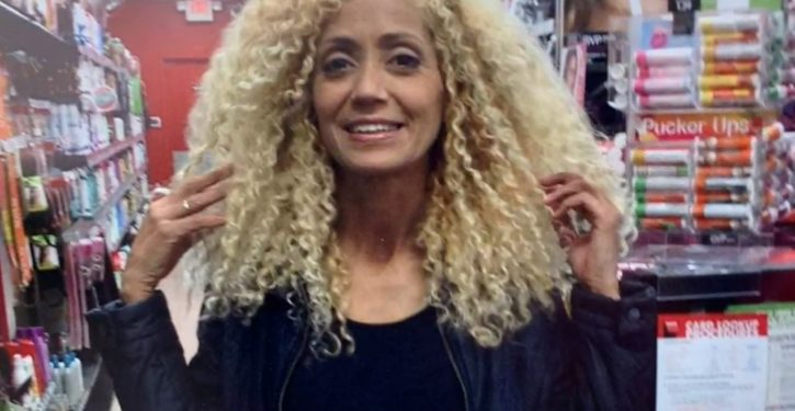 Man charged with beheading woman in Minneapolis suburb