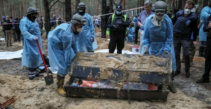 Hundreds Of Bodies Uncovered At Mass Burial Site In Ukraine, Some Show ‘Signs Of Torture’