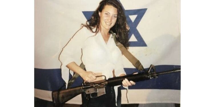 Chicago public defender sues over removal of photo of her with Israeli flag and gun