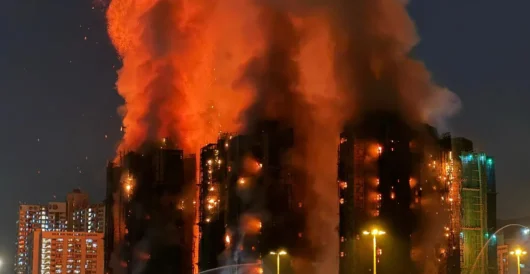 Three Arrested After Deadly Blaze Sweeps Through High Rises In Hong Kong by Daily Caller News Foundation