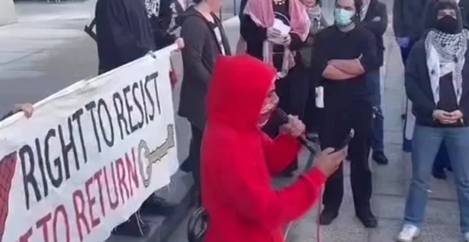 Protesters Cheer For American Troops To Return From Iran War ‘In Caskets’ by Daily Caller News Foundation